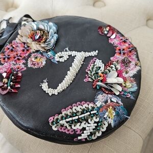 Embellished Grey Round Bag with Floral Accents Anthropologie